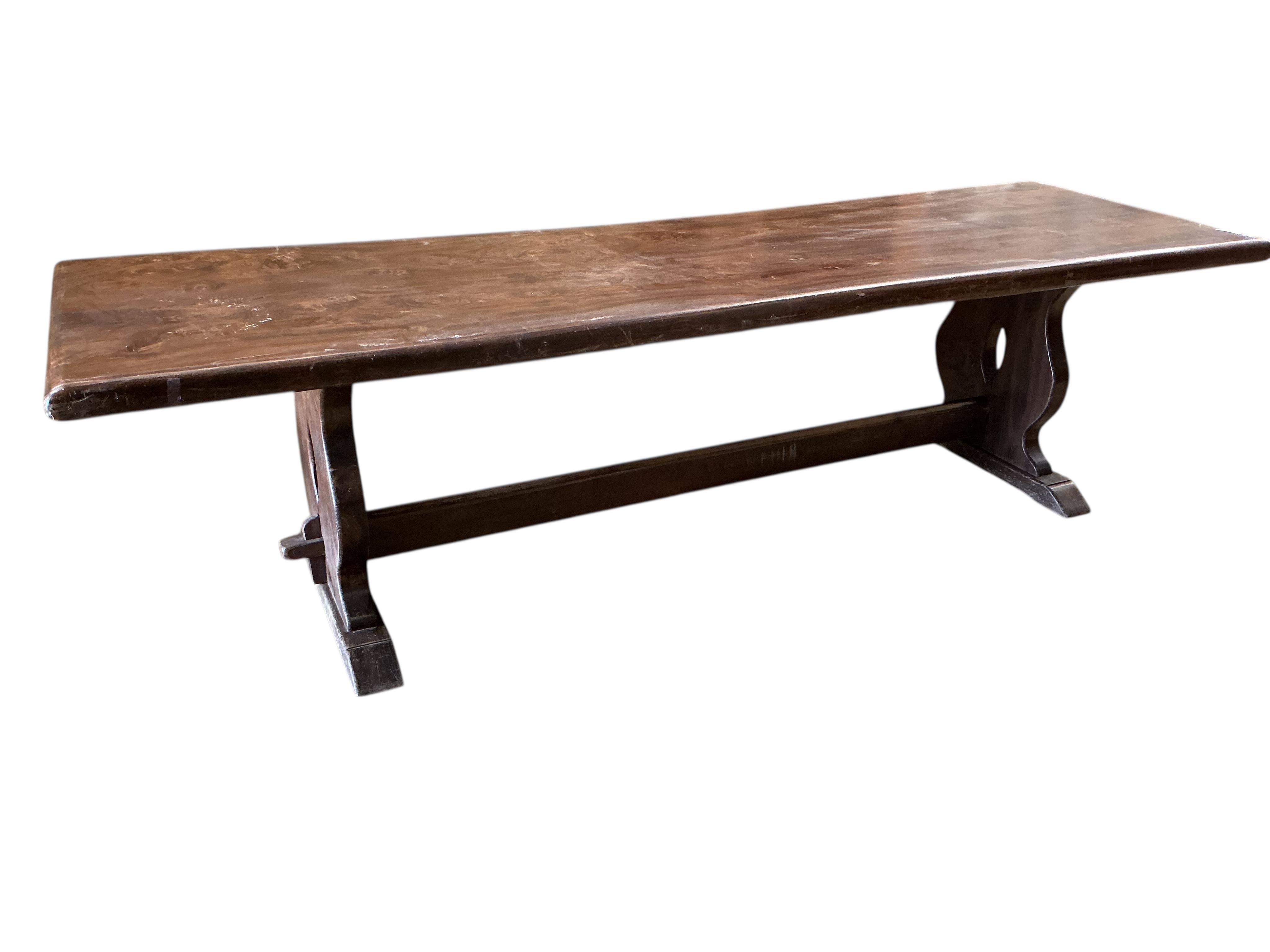 A 18th century style rectangular oak refectory dining table, width 294cm, depth 89cm, height 77cm
